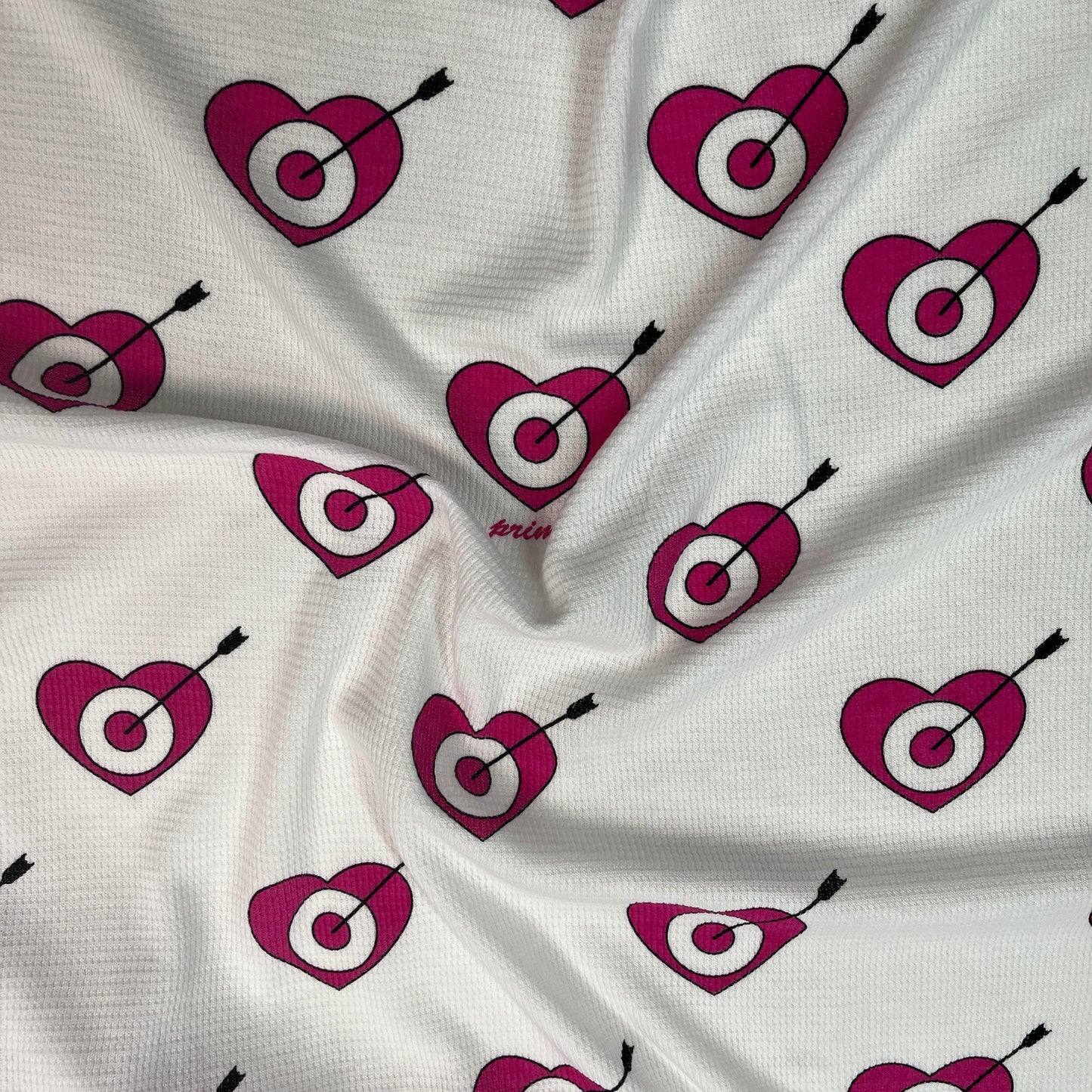 Target Hearts on White Cotton Waffle Thermal Fabric - Nature's Fabrics