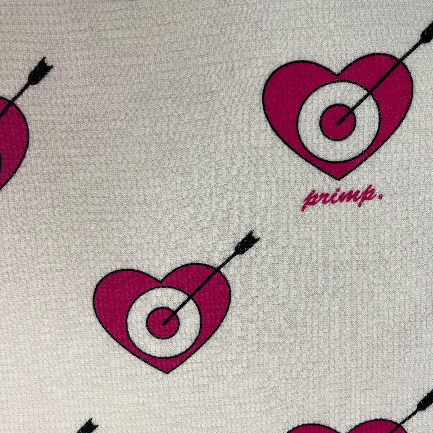 Target Hearts on White Cotton Waffle Thermal Fabric - Nature's Fabrics