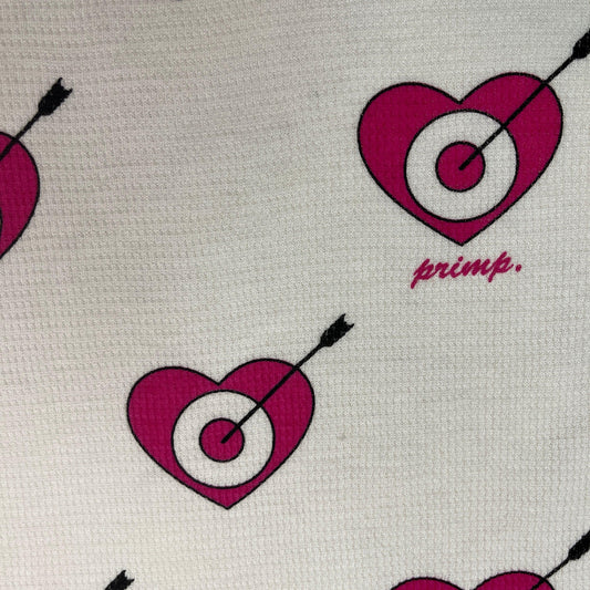 White Nature's Fabrics material with pink heart targets and 'primp' text.