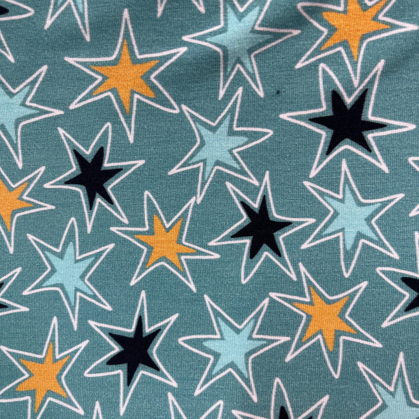 Texas Stars on Blue Bamboo/Spandex Jersey Fabric - Nature's Fabrics