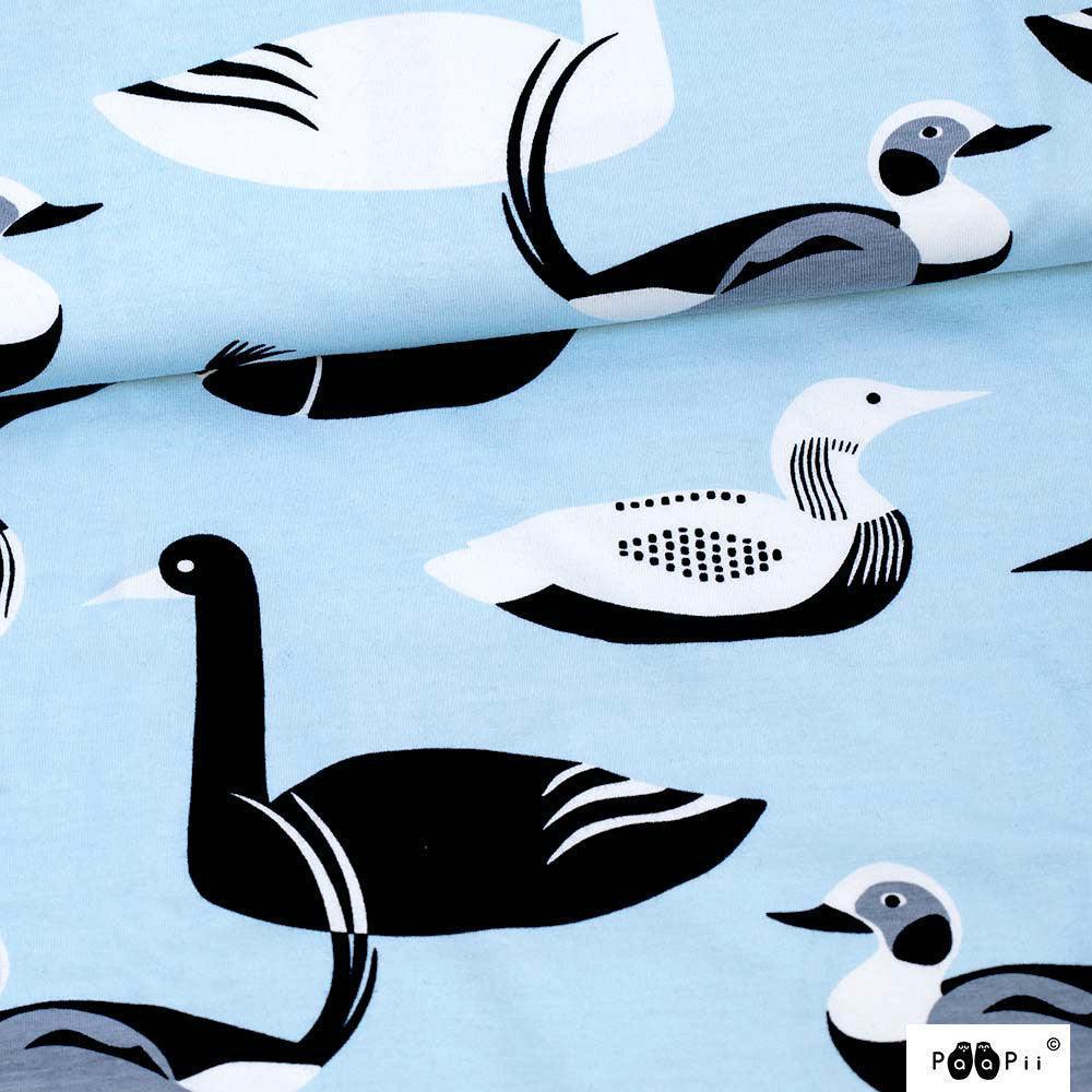 Nature's Fabrics light blue organic cotton fabric with black and white bird pattern