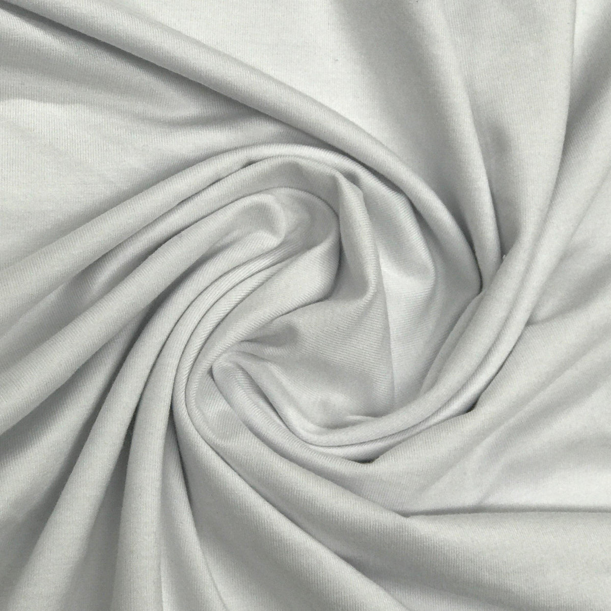 Swirled white organic cotton fabric from Nature's Fabrics.