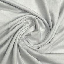 Close-up of draped white organic fabric from Nature's Fabrics.