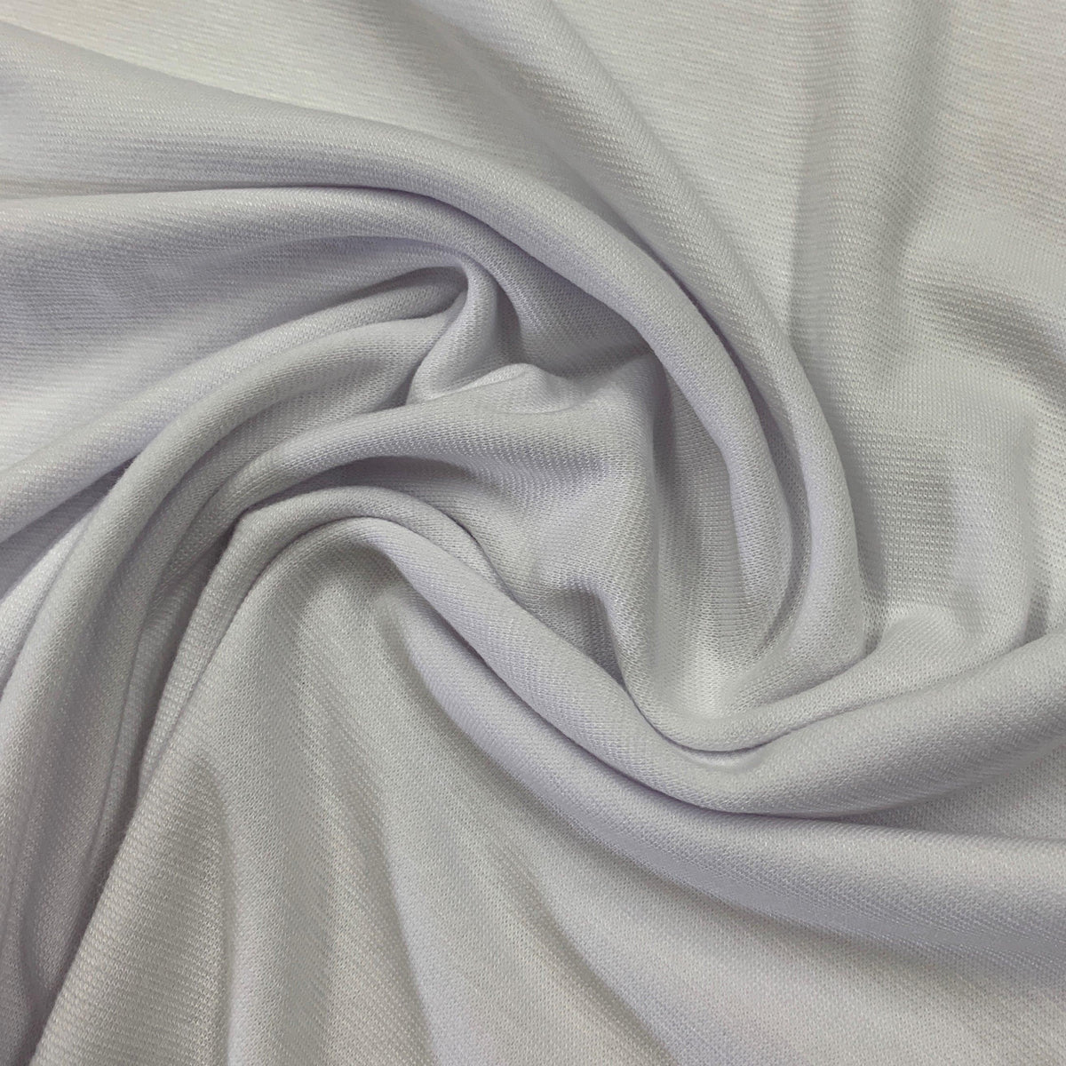 Close-up of draped white premium natural fabric from Nature's Fabrics