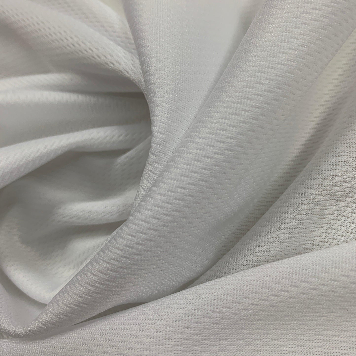 White Polyester Athletic Wicking Jersey Fabric - Nature's Fabrics