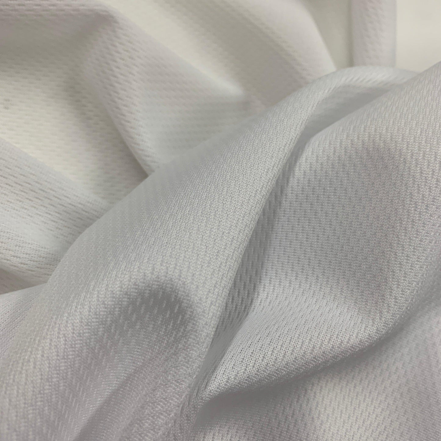 White Polyester Athletic Wicking Jersey Fabric - Nature's Fabrics