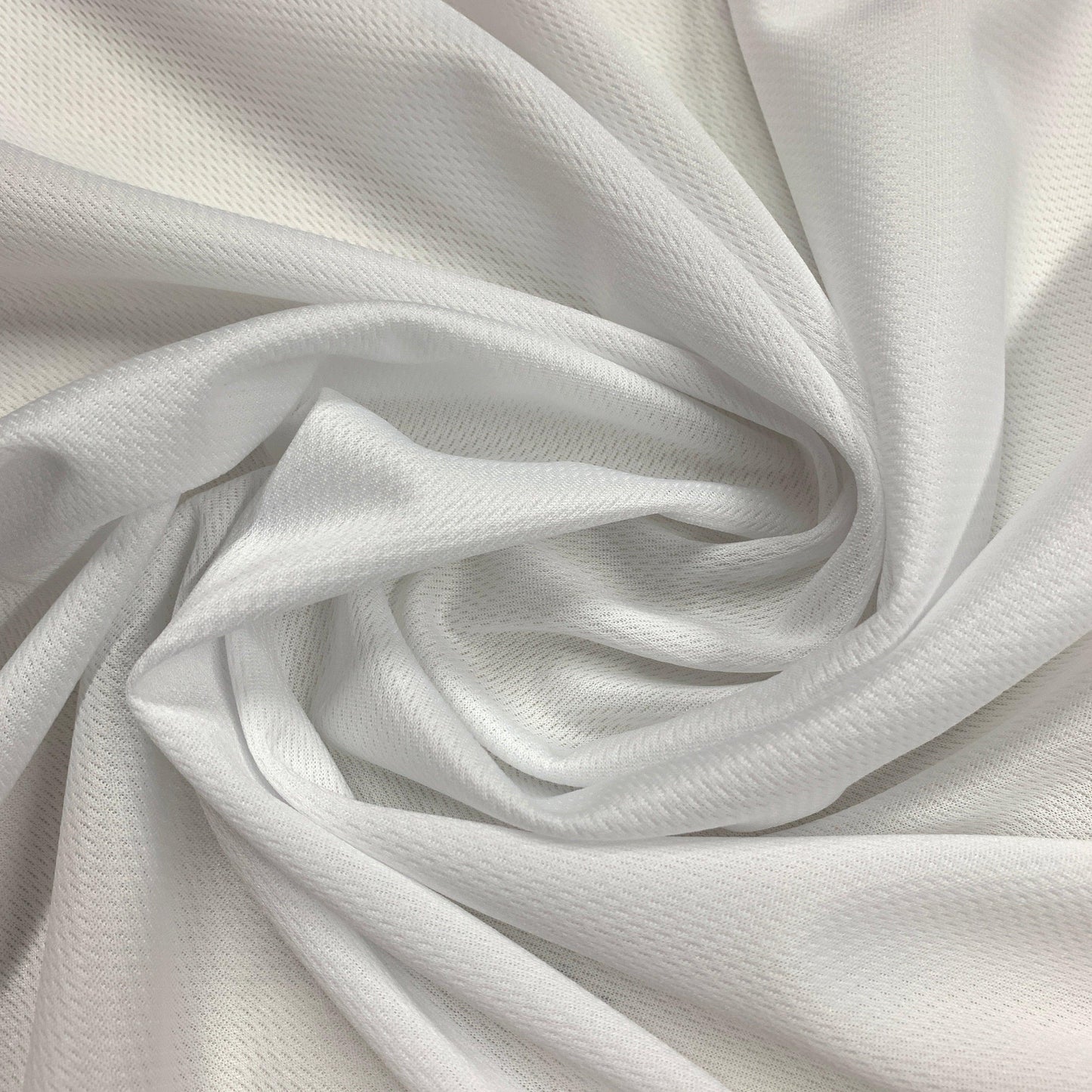White Polyester Athletic Wicking Jersey Fabric - Nature's Fabrics