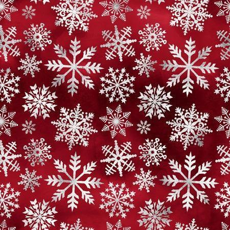 Nature's Fabrics red fabric with a silver snowflake pattern.