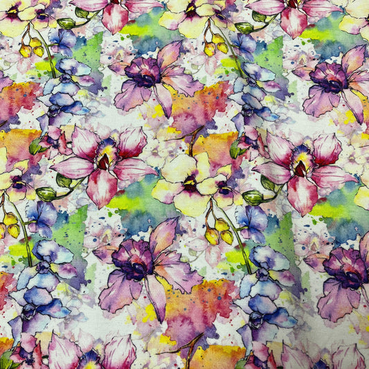 Nature's Fabrics watercolor floral print fabric featuring pink, purple, and yellow orchids.