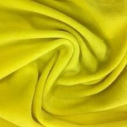 Yellow fabric draped in soft folds from Nature's Fabrics