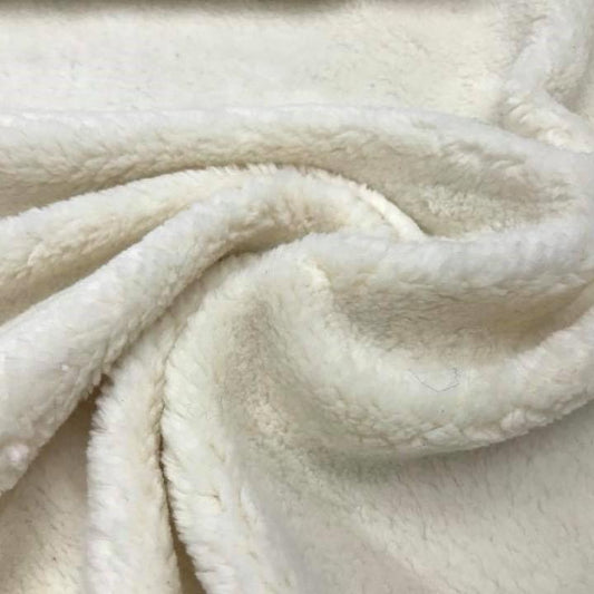 Heavy natural organic cotton sherpa fabric, cream color, soft plush texture