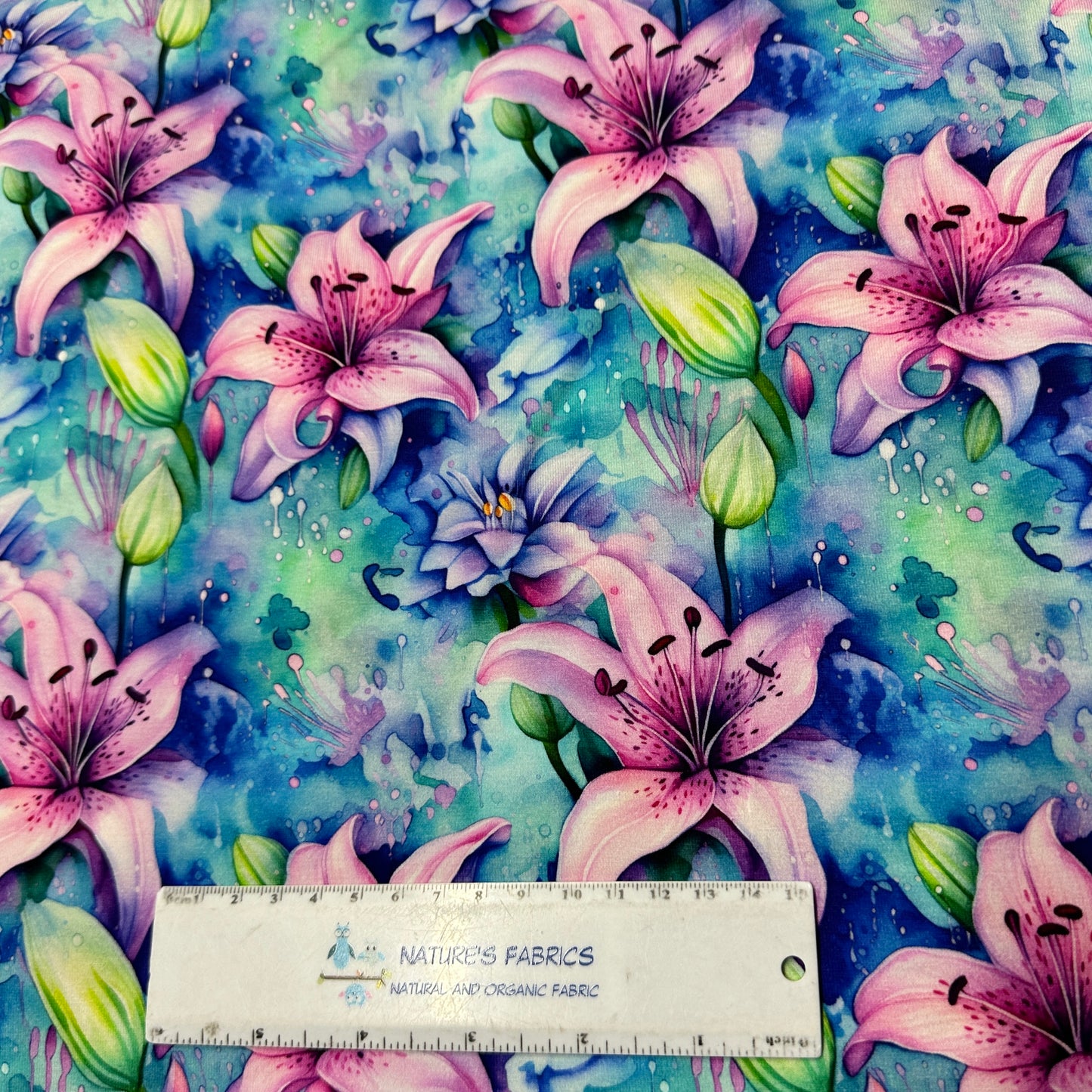 Lillies on Blue Organic Cotton/Spandex Jersey Fabric