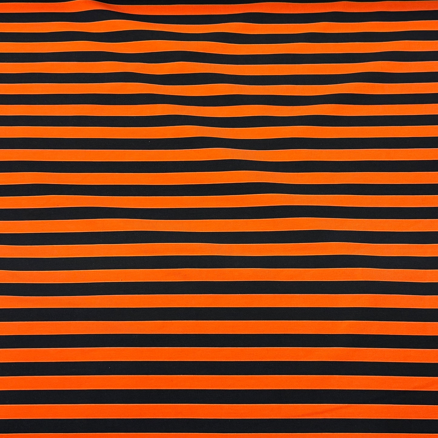 Black and Orange Stripes on Cotton/Spandex Jersey Fabric