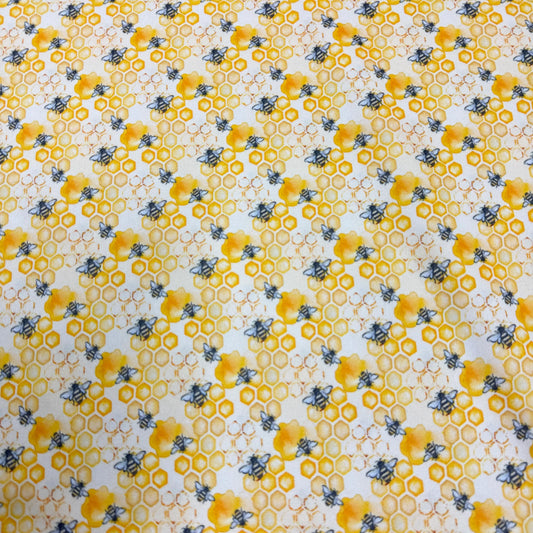 Bee and honeycomb pattern fabric by Nature's Fabrics, organic cotton print for quilting and crafts