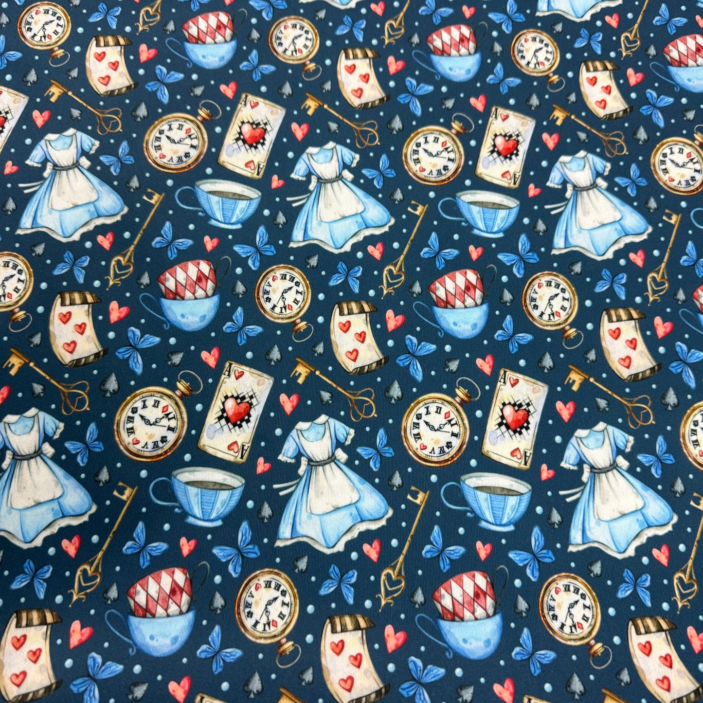 Alice in Wonderland on Blue 1 mil PUL Fabric - Made in the USA