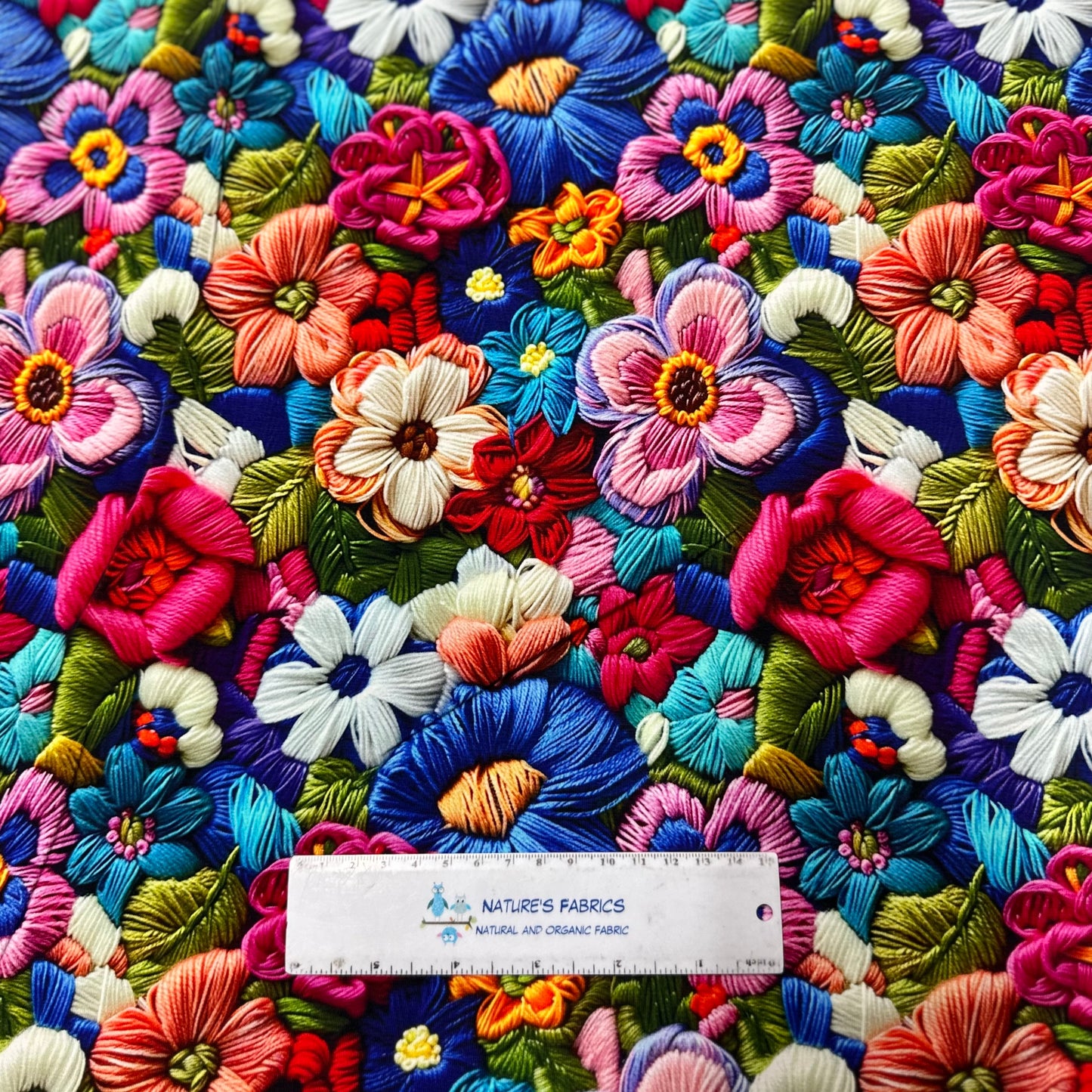 Embroidered Bright Flowers on Organic Cotton/Spandex Jersey Fabric