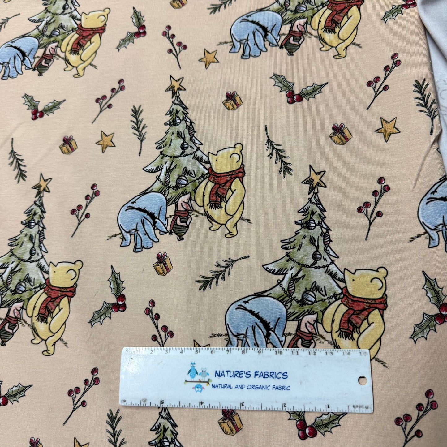 Winnie the Pooh Christmas on Tan Bamboo/Spandex Jersey Fabric