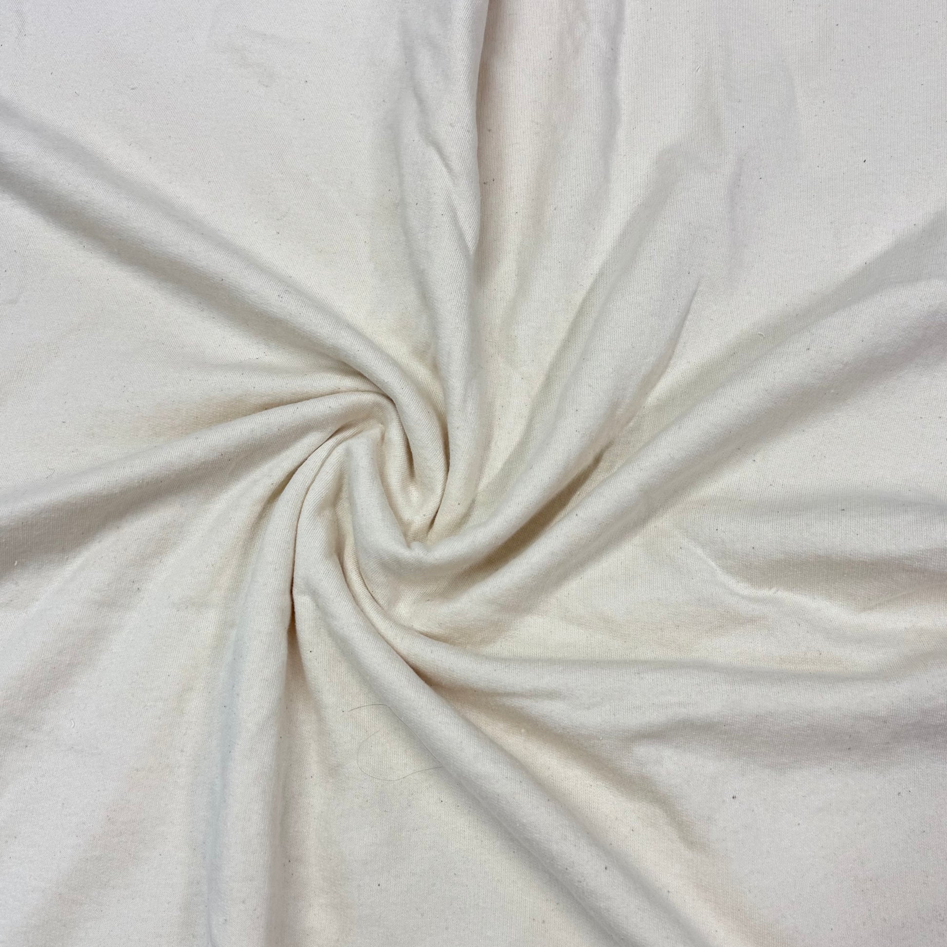 Nature's Fabrics organic cotton fabric swirled texture, natural off-white by the yard