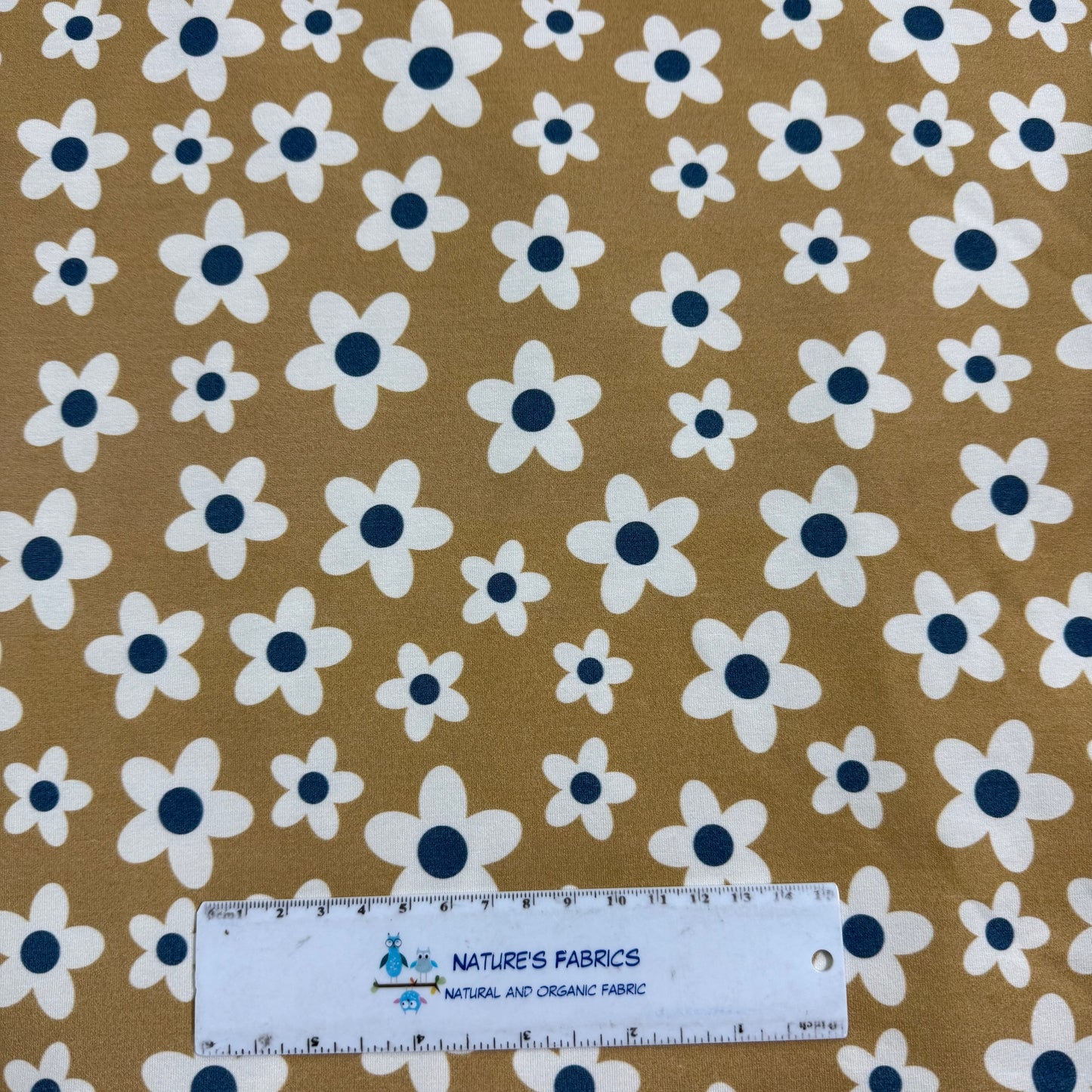 Off White Flowers on Tan Bamboo/Spandex Jersey Fabric - Printed in the USA
