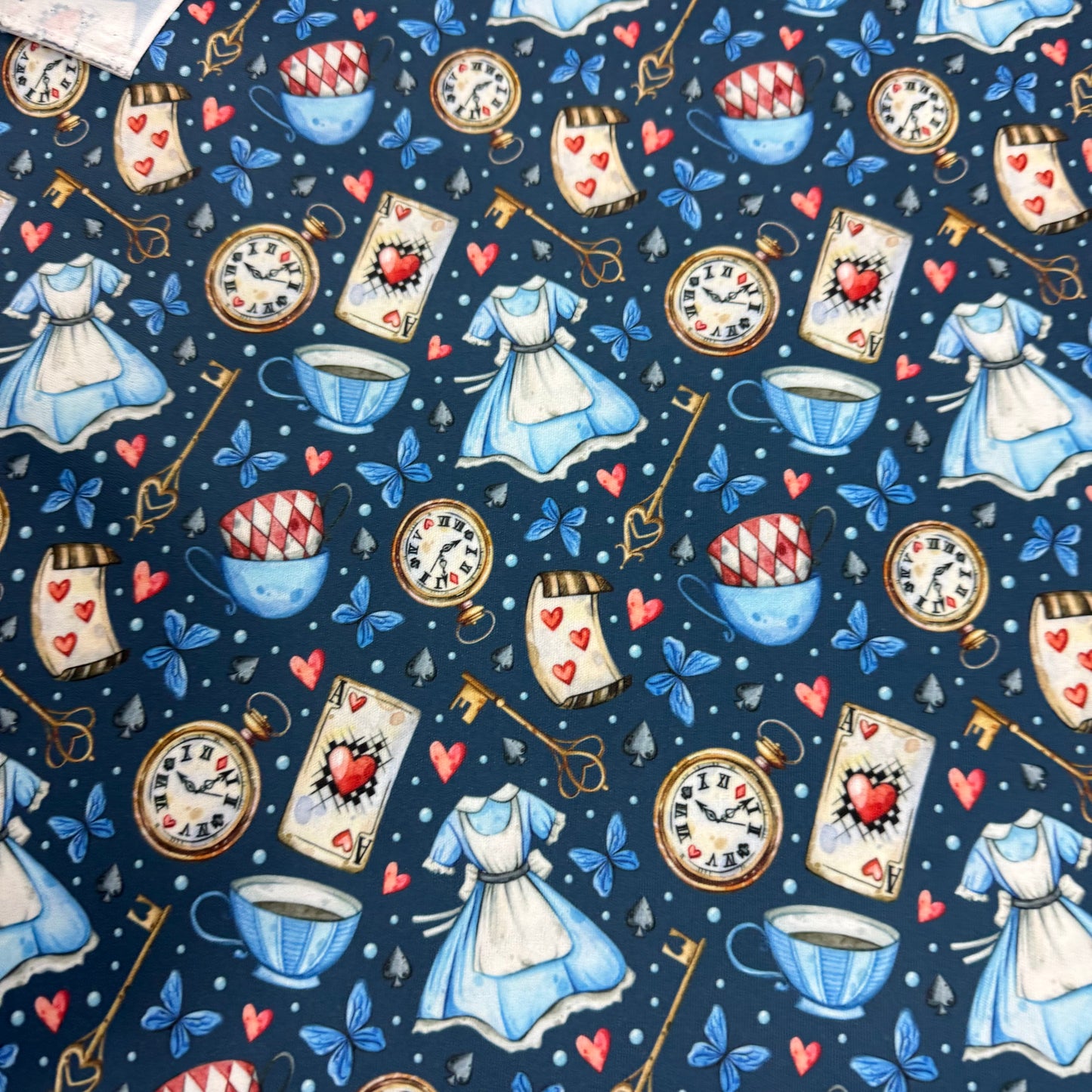 Alice in Wonderland on Blue 1 mil PUL Fabric - Made in the USA