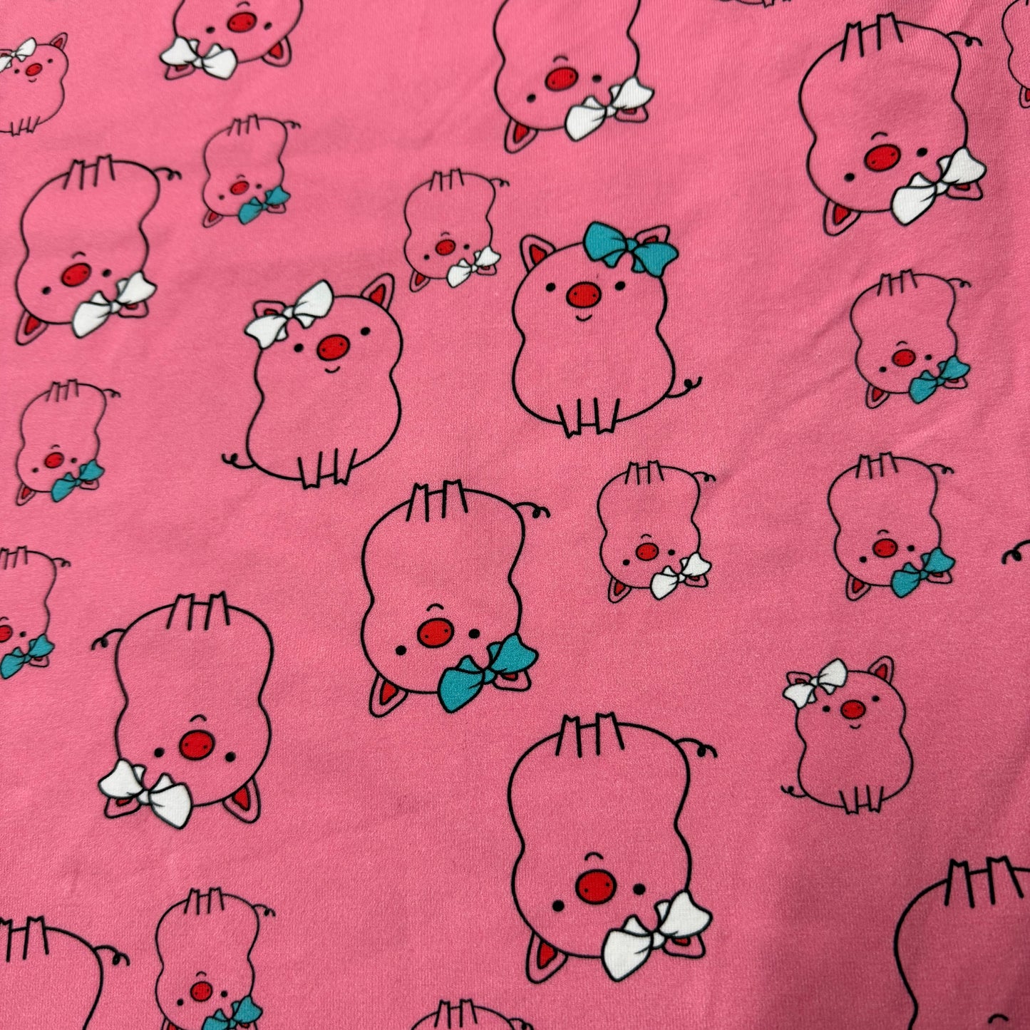 Pink Pigs on Pink Cotton/Spandex Jersey Fabric