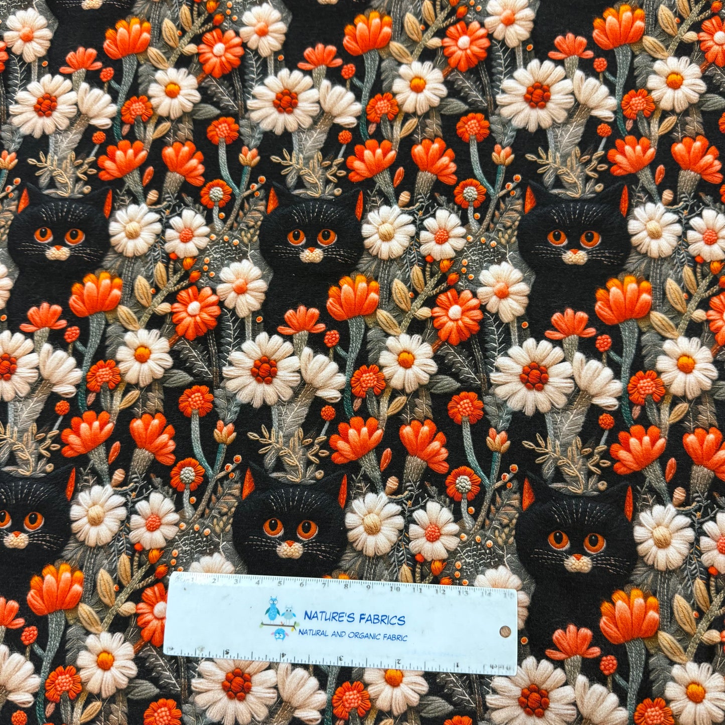 Embroidered Black Cats in the Garden on Bamboo/Spandex Jersey Fabric