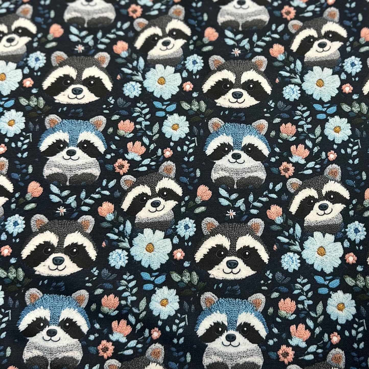 Embroidered Raccoons on Blue 1 mil PUL Fabric - Made in the USA