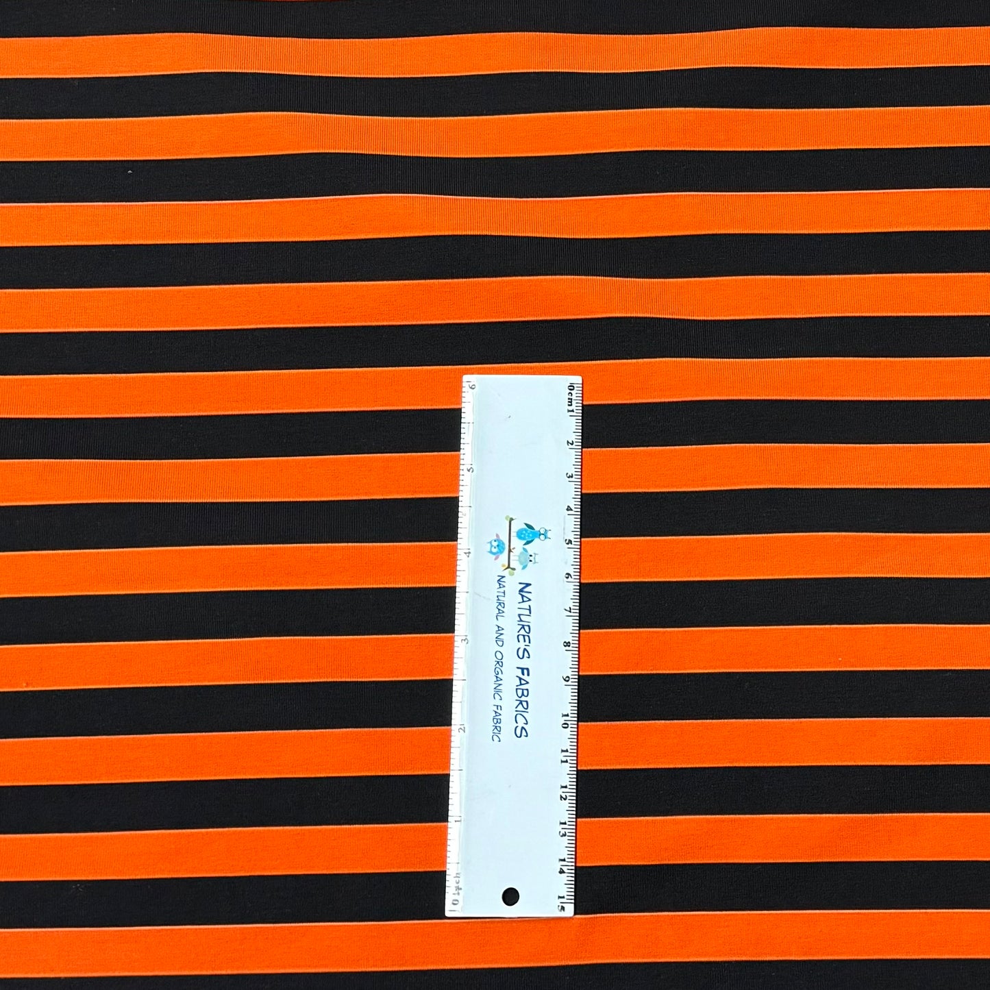 Black and Orange Stripes on Cotton/Spandex Jersey Fabric
