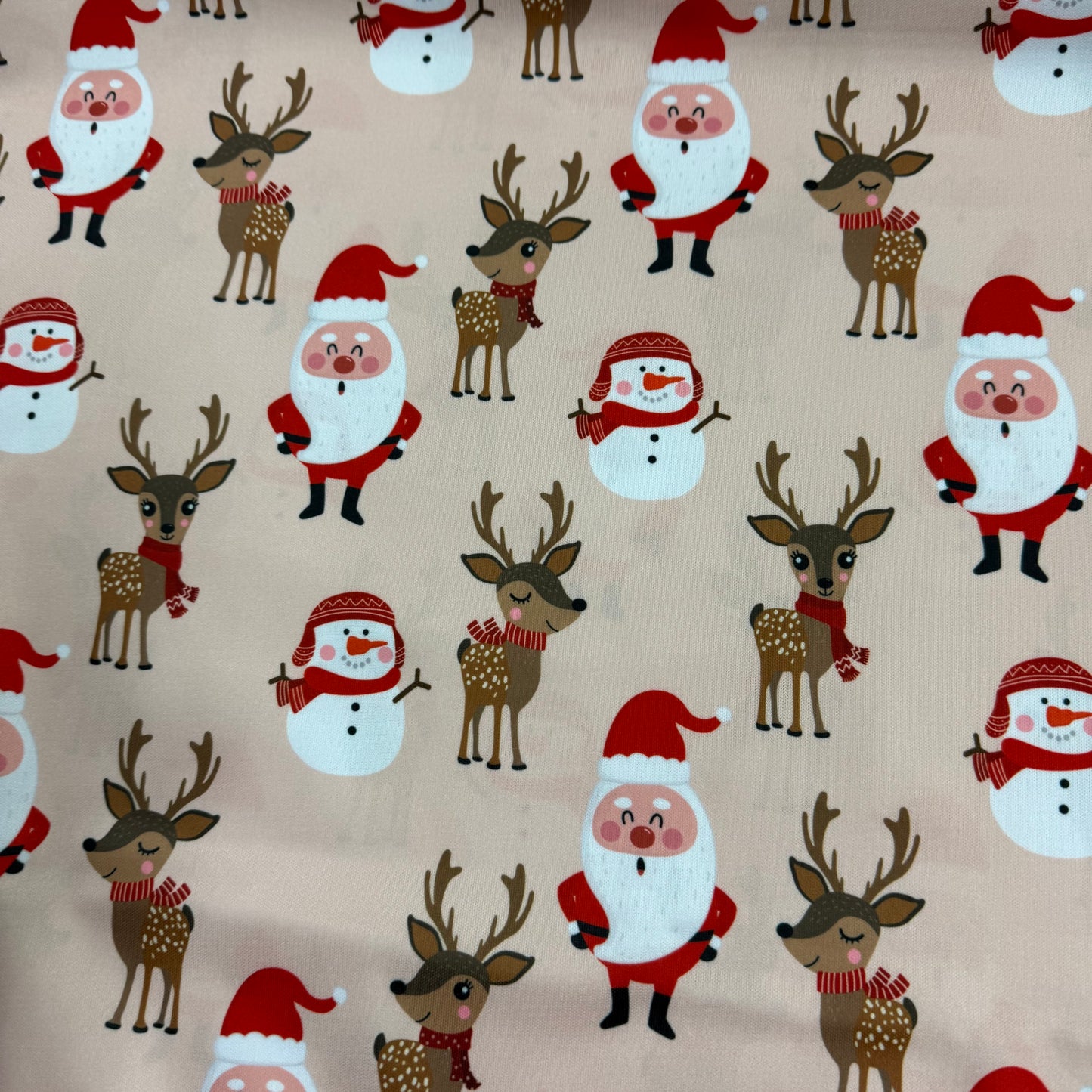 Santa and Reindeer on Peach 1 mil PUL Fabric - Made in China- Seconds