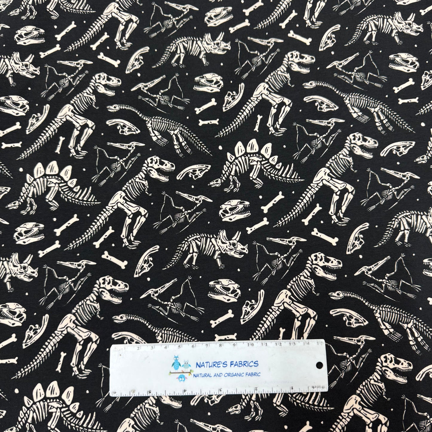 Dino Skeletons on Organic Cotton/Spandex Jersey Fabric
