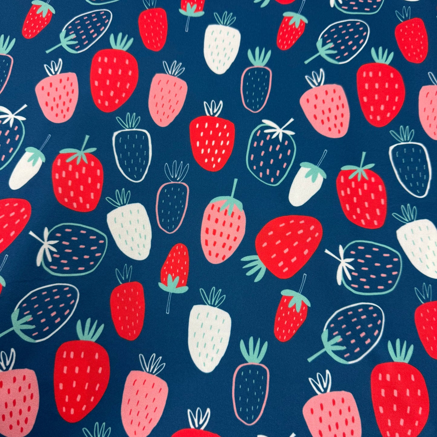 Summer Strawberries on Navy 1 mil PUL Fabric - Made in the USA