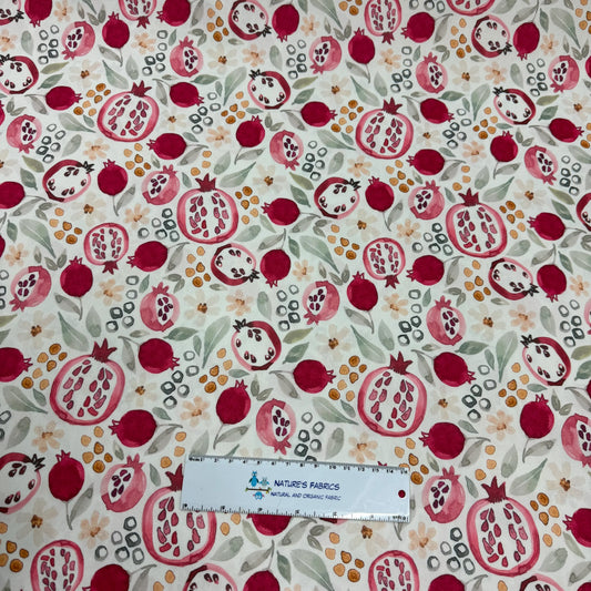 Pomegranate print organic cotton fabric by Nature's Fabrics, eco-friendly natural textile with vibrant fruit design