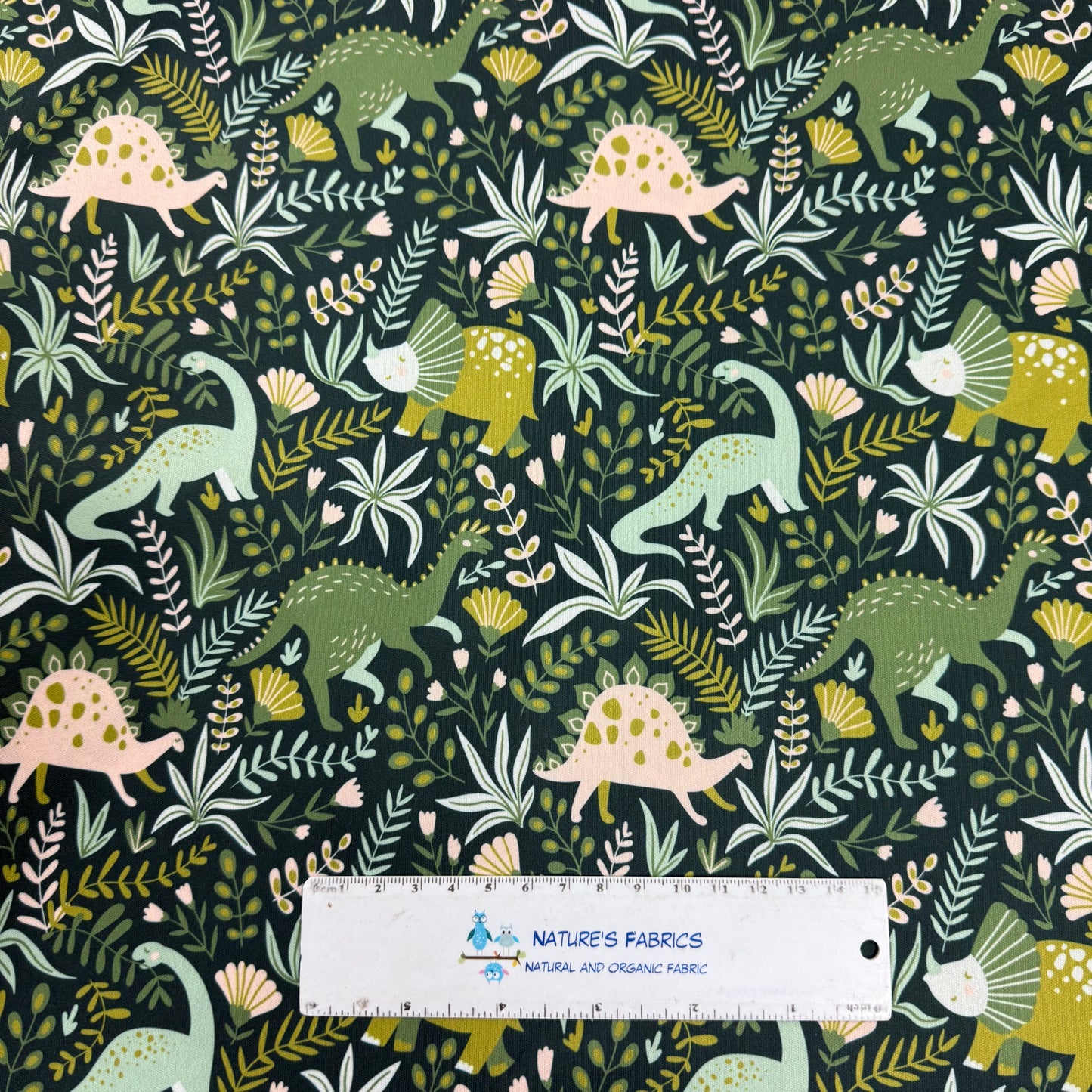 Green Dino on Green 1 mil PUL Fabric - Made in the USA