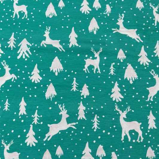 Off White Reindeer on Teal Bamboo/Spandex Jersey Fabric Pritned in the USA