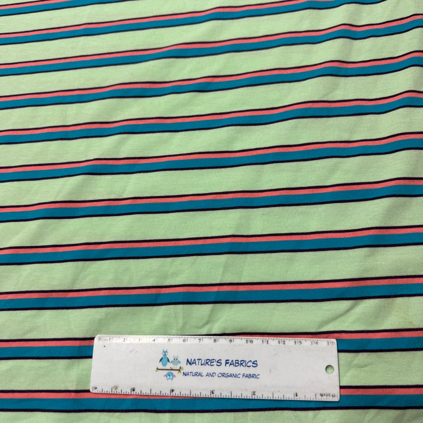 Blue and Peach Stripes on Mint Cotton/Spandex Jersey Fabric