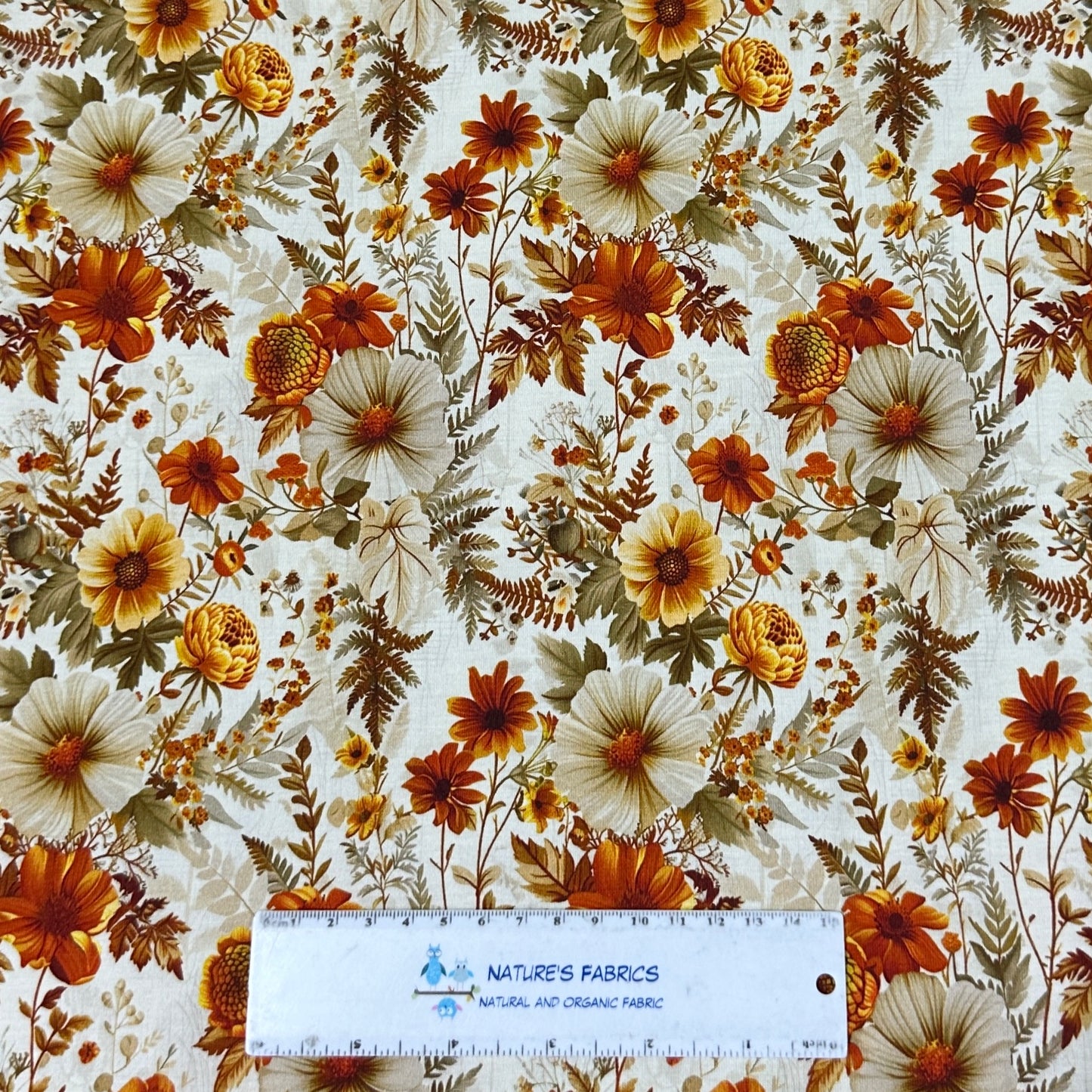 Ivory and Orange Flowers on Bamboo/Spandex Jersey Fabric