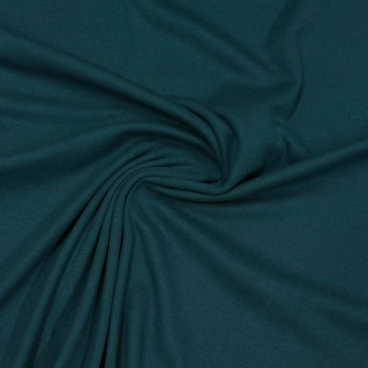 Deep teal ribbed organic cotton fabric by Nature's Fabrics, soft texture ideal for eco-friendly sewing projects