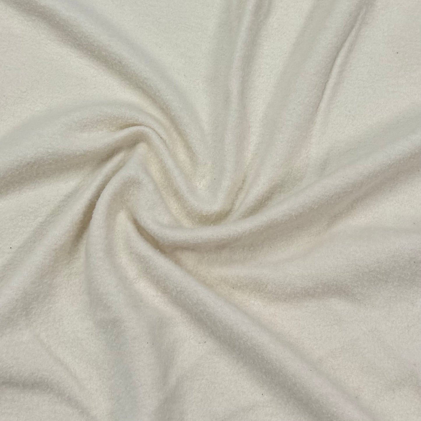 Soft cream organic cotton fabric by Nature's Fabrics, ideal for eco-friendly sewing projects