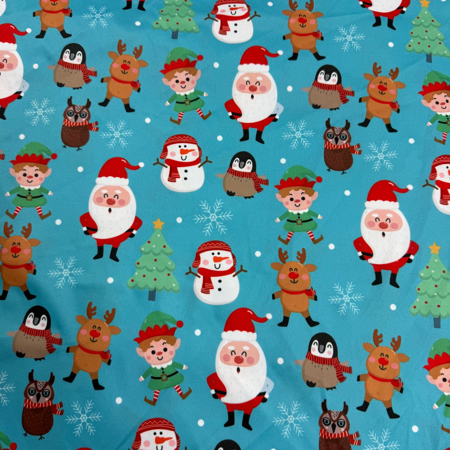 Santa and Friends on Blue 1 mil PUL Fabric - Made in China- Seconds