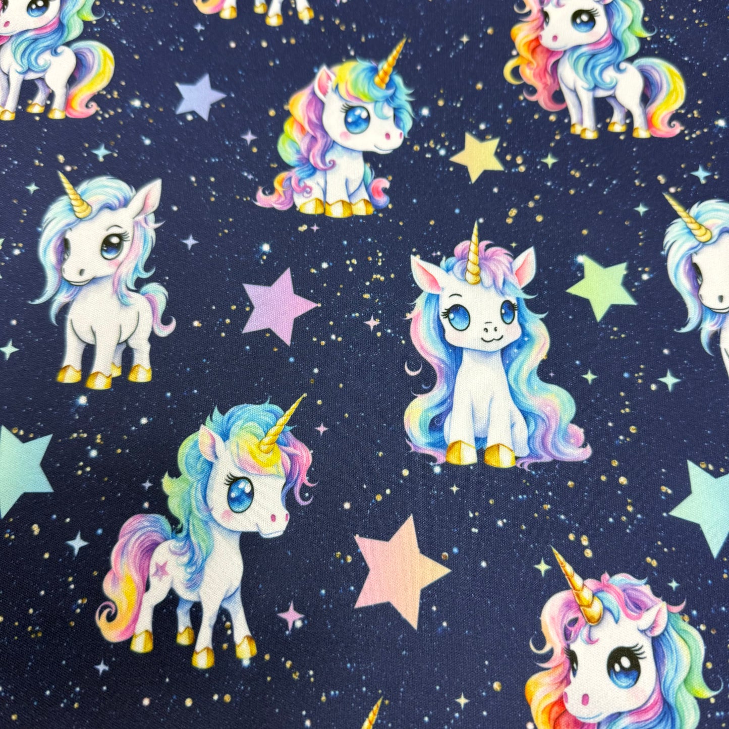 Cartoon Unicorns on 1 mil PUL Fabric - Made in the USA