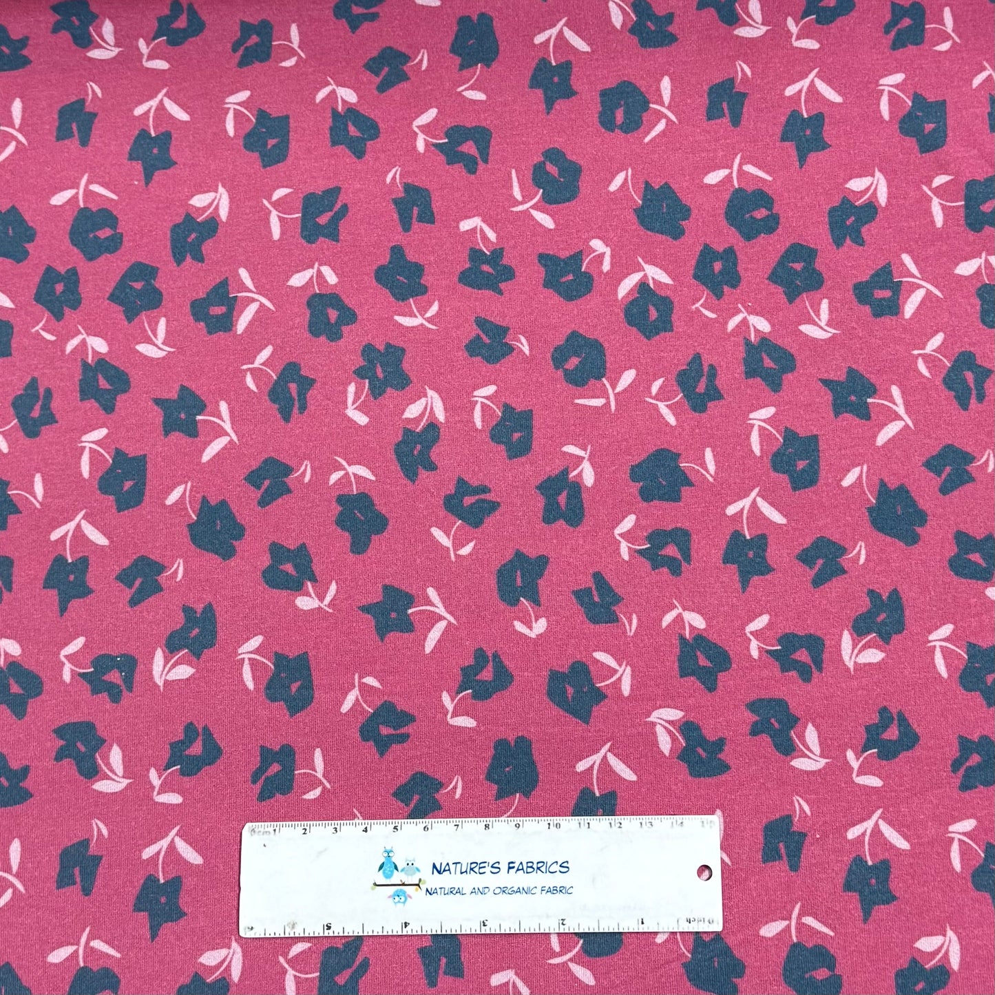Blue Flowers on Rose Bamboo/Spandex Jersey Fabric - Printed in the USA
