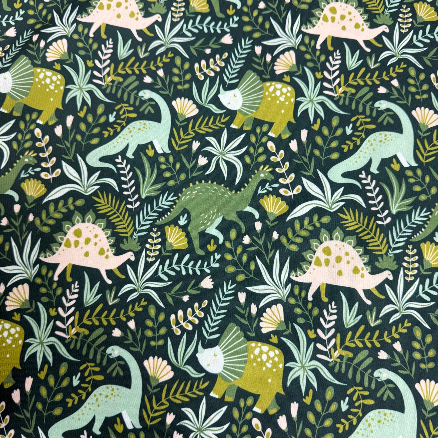 Green Dino on Green 1 mil PUL Fabric - Made in the USA