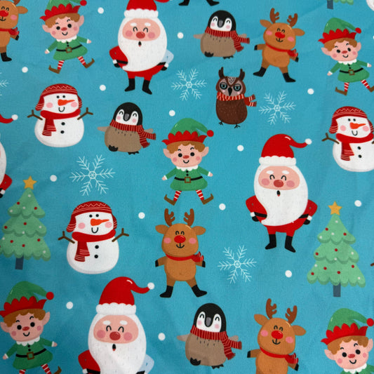 Santa and Friends on Blue 1 mil PUL Fabric - Made in China- Seconds