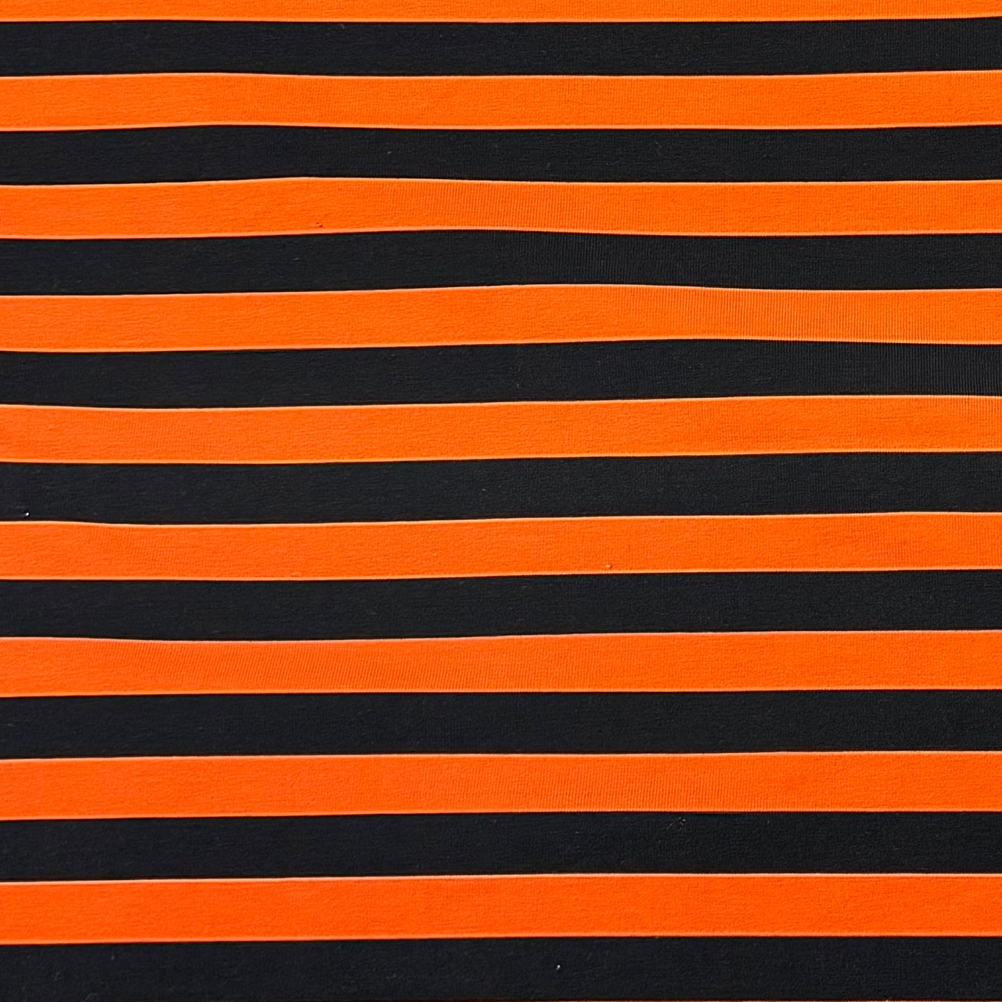 Black and Orange Stripes on Cotton/Spandex Jersey Fabric