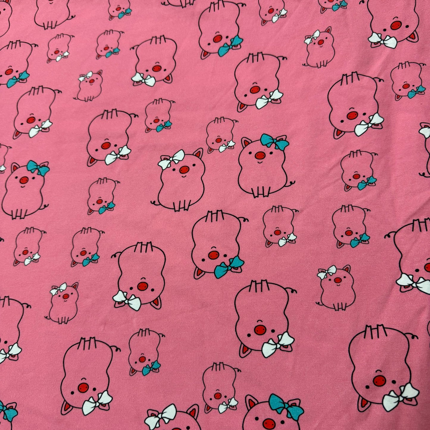 Pink Pigs on Pink Cotton/Spandex Jersey Fabric