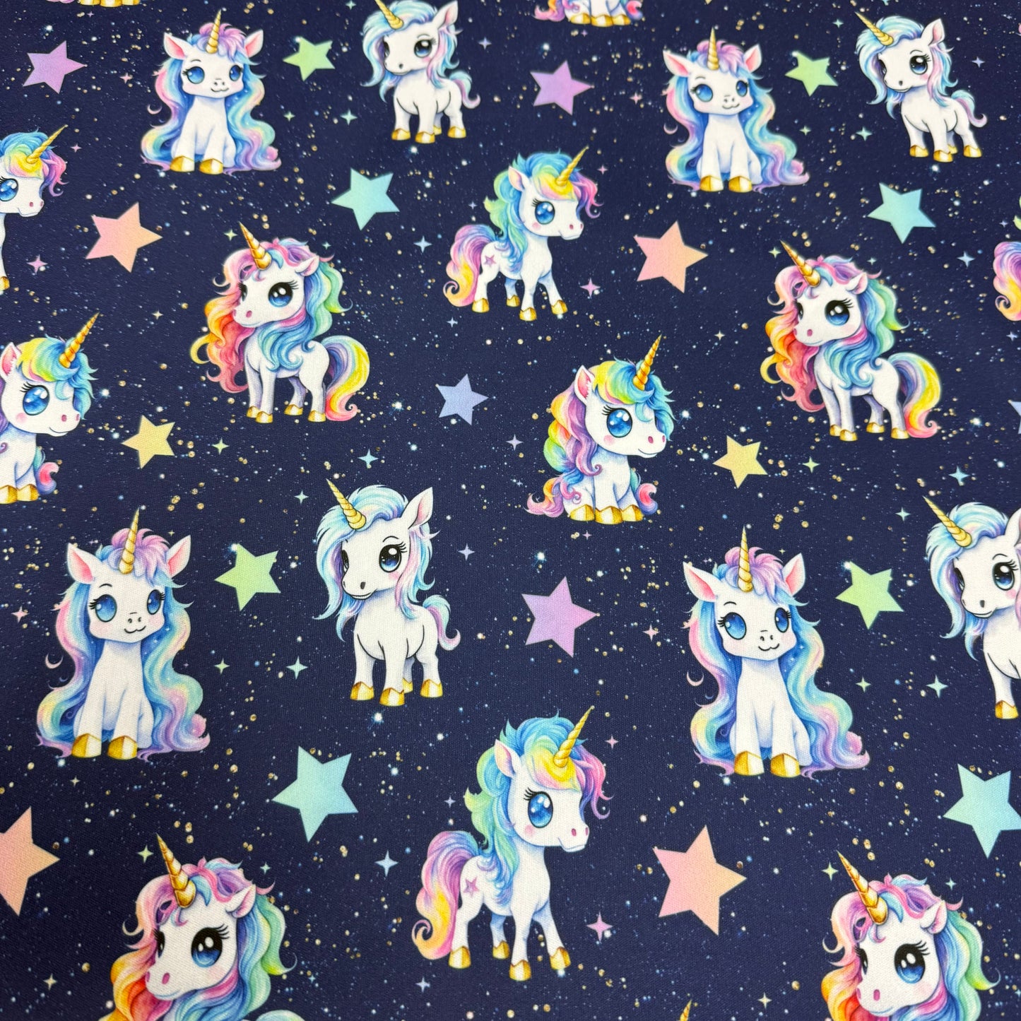 Cartoon Unicorns on 1 mil PUL Fabric - Made in the USA