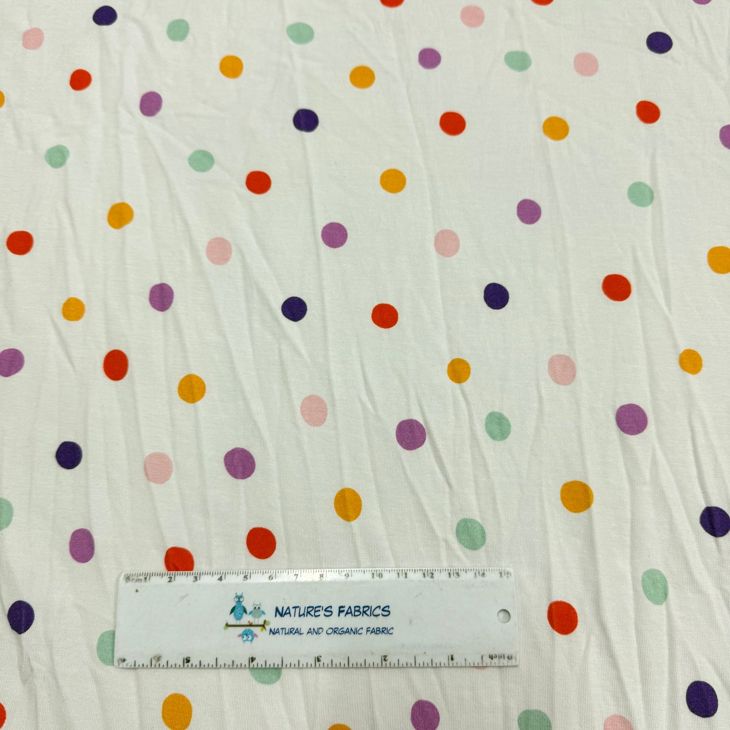Bright 3/8" Dots on White Bamboo/Spandex Jersey Fabric - 200 GSM