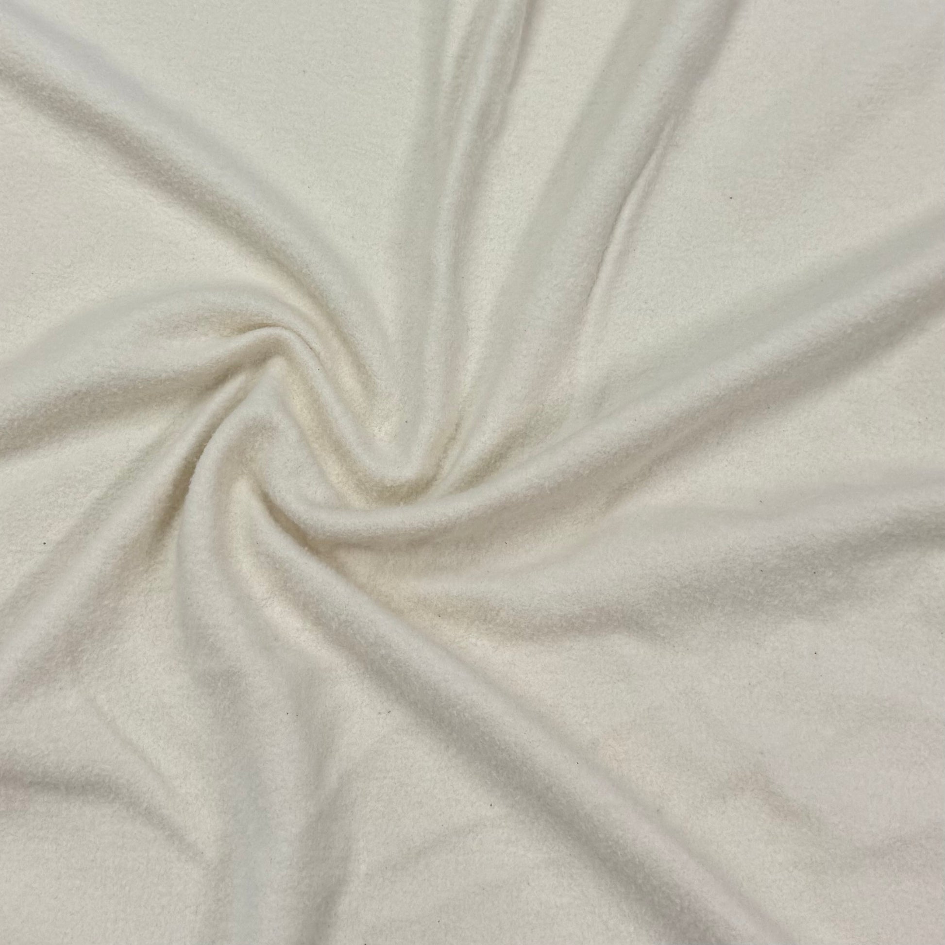 Soft cream organic cotton fabric swirled texture by Nature's Fabrics