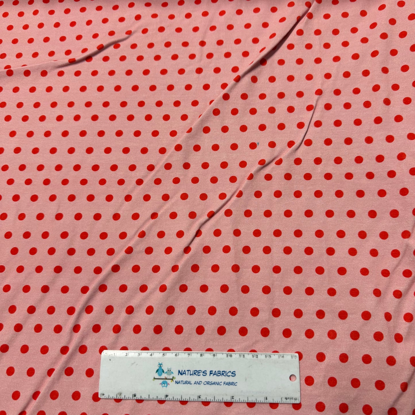 Pink Polka Dots on Pink Cotton/Spandex Jersey Fabric