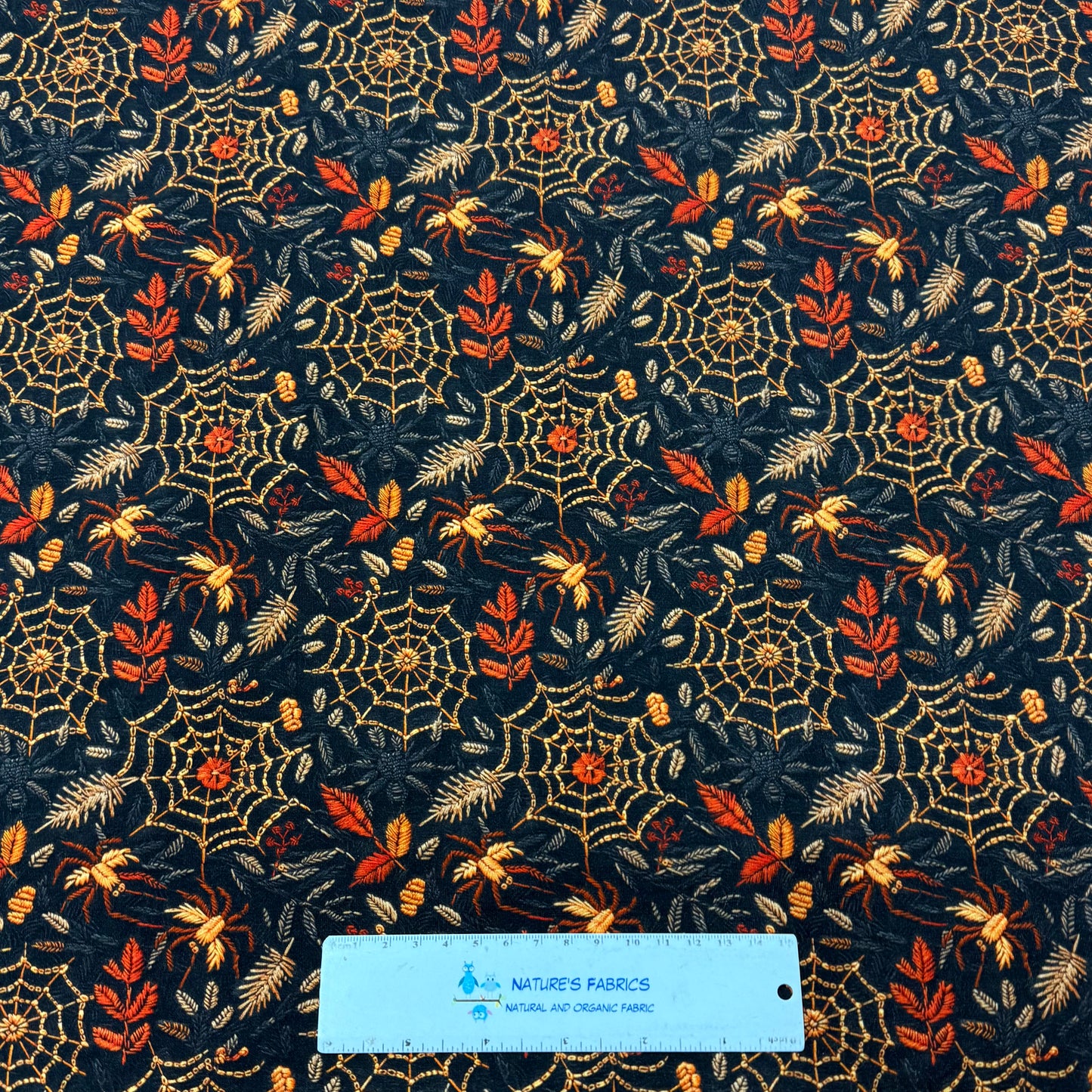 Embroidered Spiders and Webs on Organic Cotton/Spandex Jersey Fabric
